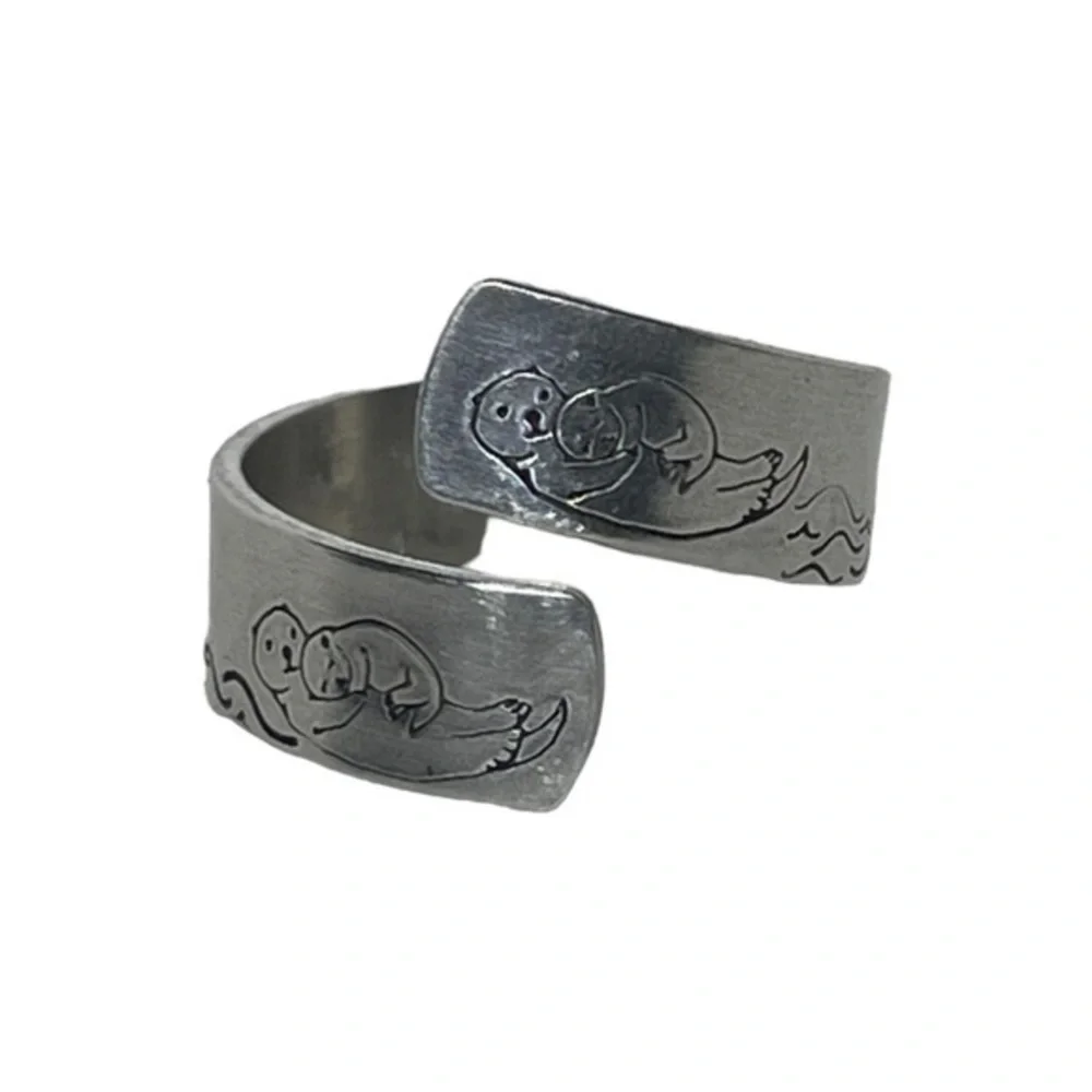 Handmade 8 stamped sea otter silver hypoallergenic aluminum adjustable wrap ring